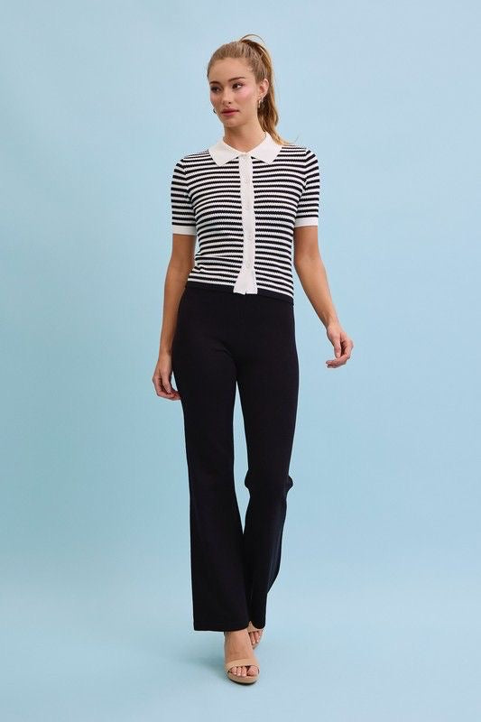 Set blusa rayas blanco y negro con pantalón palazzo negro