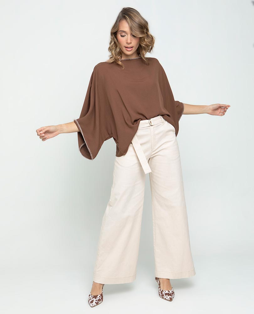 WOMEN'S PONCHO-STYLE BLOUSE WITH HAND-STITCHED DETAILS ON THE NECKLINE AND SLEEVES