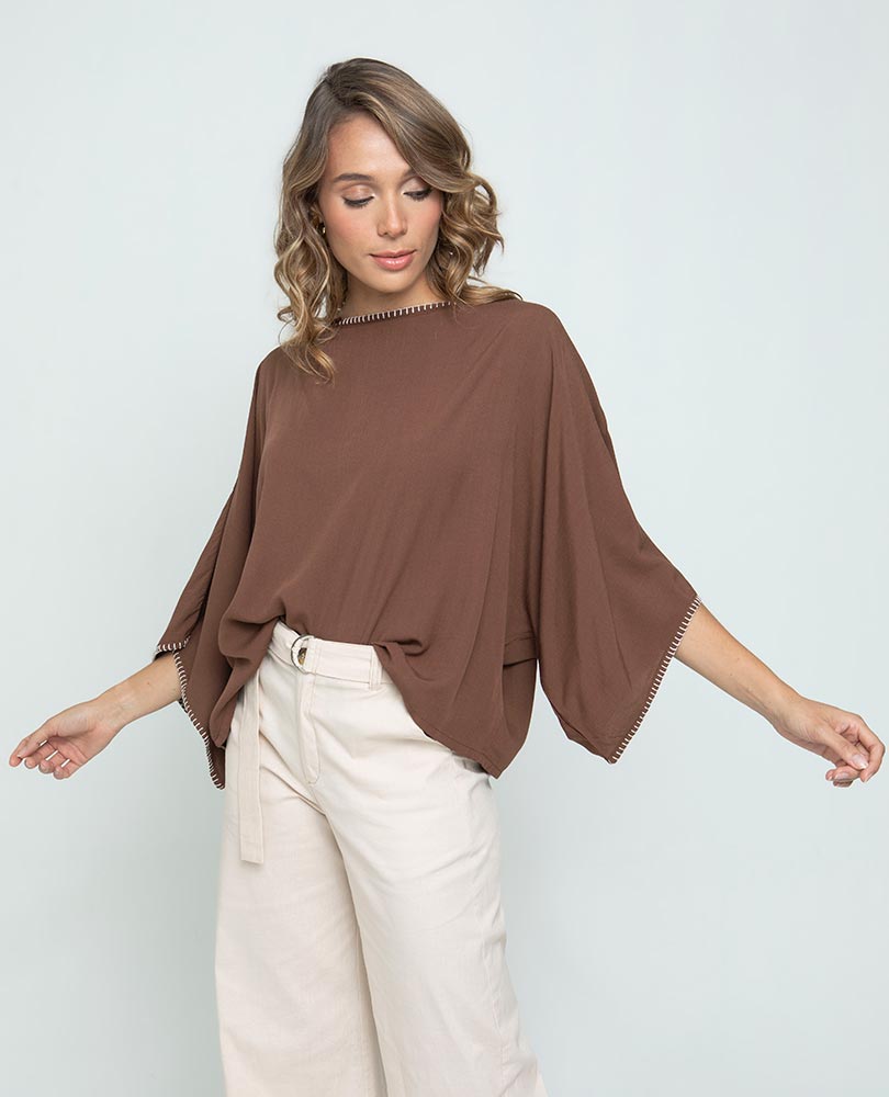 WOMEN'S PONCHO-STYLE BLOUSE WITH HAND-STITCHED DETAILS ON THE NECKLINE AND SLEEVES