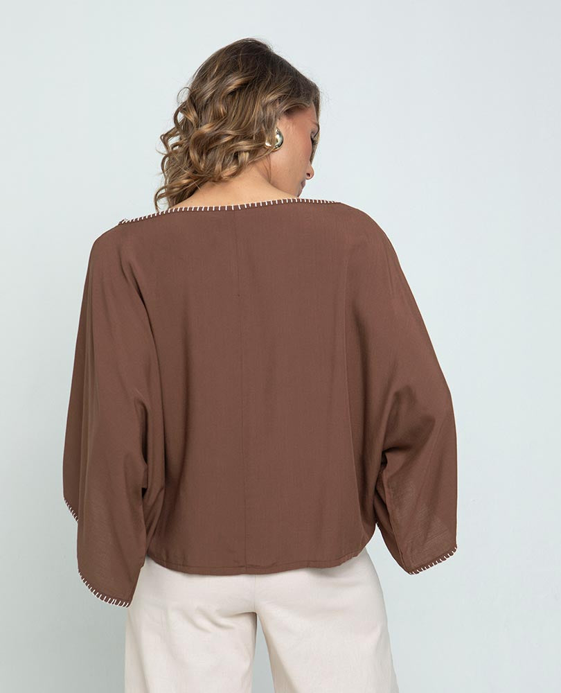 WOMEN'S PONCHO-STYLE BLOUSE WITH HAND-STITCHED DETAILS ON THE NECKLINE AND SLEEVES