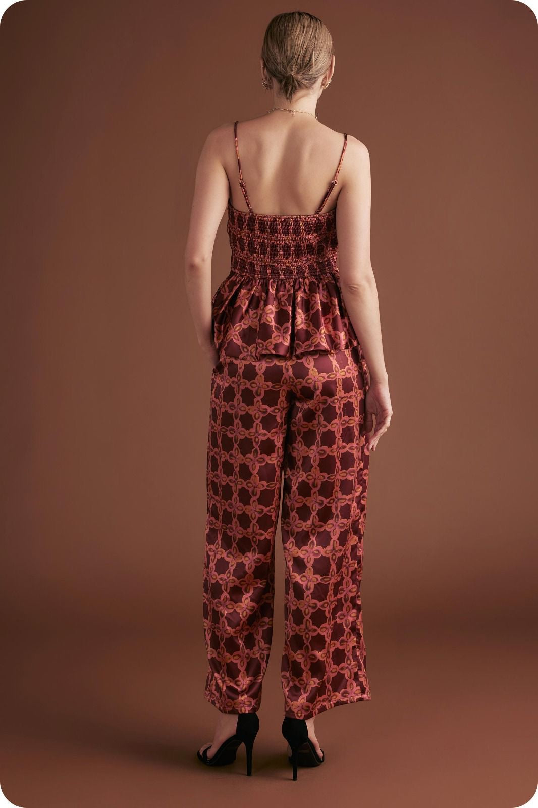 Set de dos piezas para mujer en estampado geométrico – Top peplum y pantalón wide leg