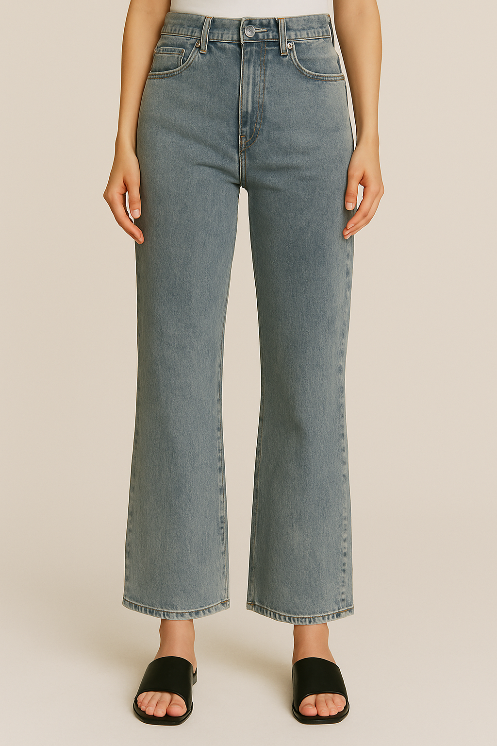 conjunto de la imagen está compuesto por dos piezas de mezclilla (denim):

Chaleco corto: sin mangas, color azul mezclil