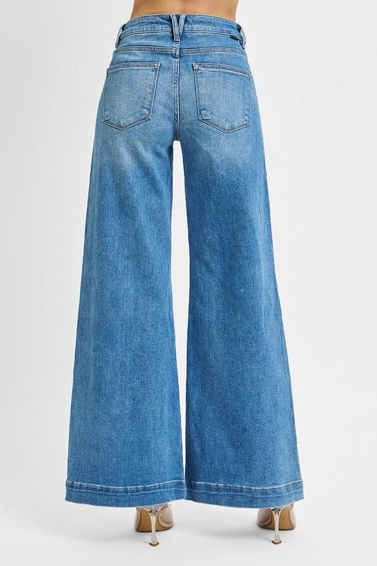 Jean wide leg tiro alto con bolsillos frontales y dobladillo ancho | Denim licrado para mujer