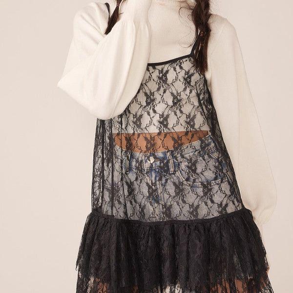 Vestido corto en encaje negro transparente